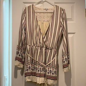 Long sleeve beige romper w/lace back detail